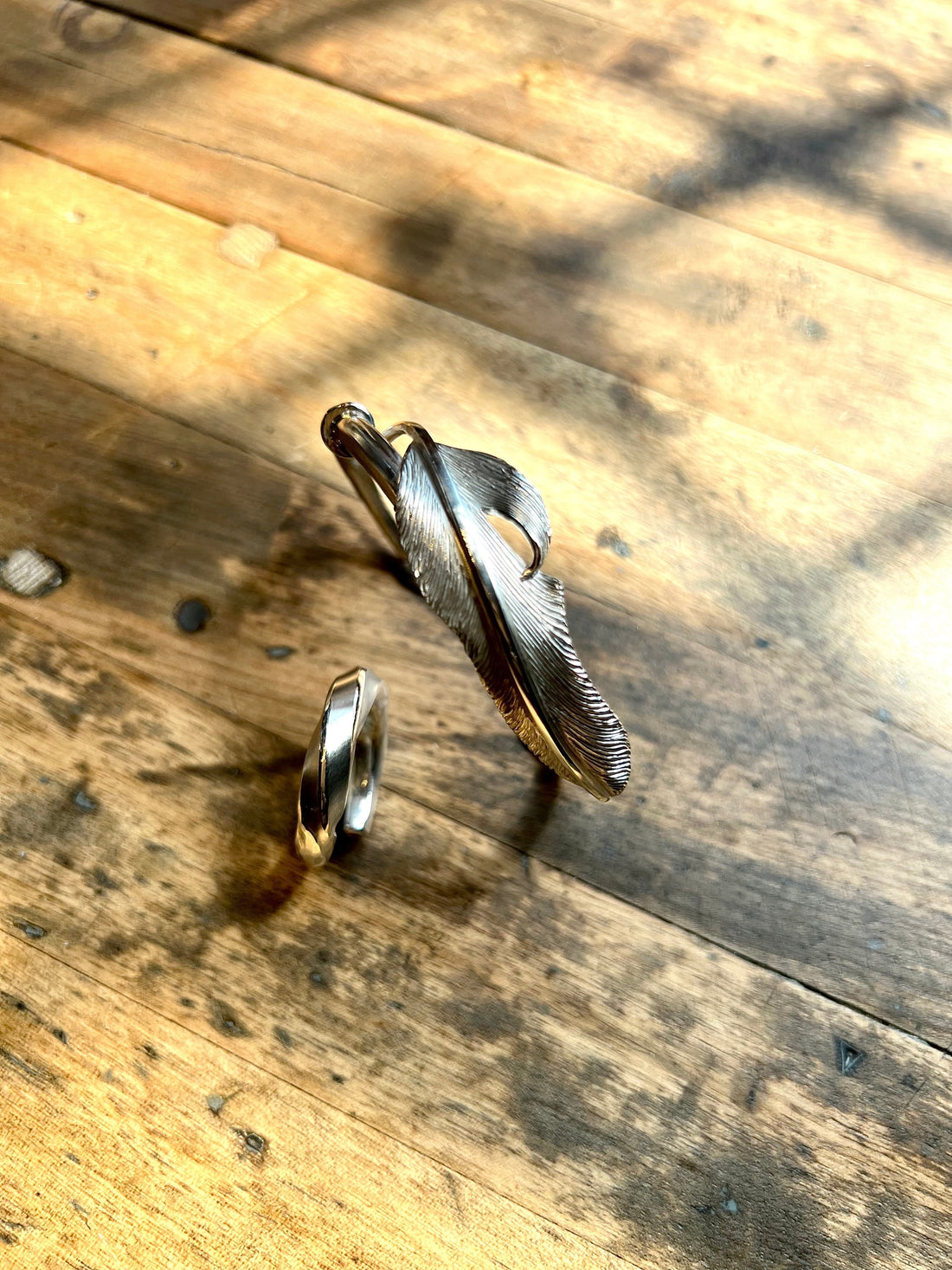 The Challenge to Capture Movement - Feather Cuff and Ring Set