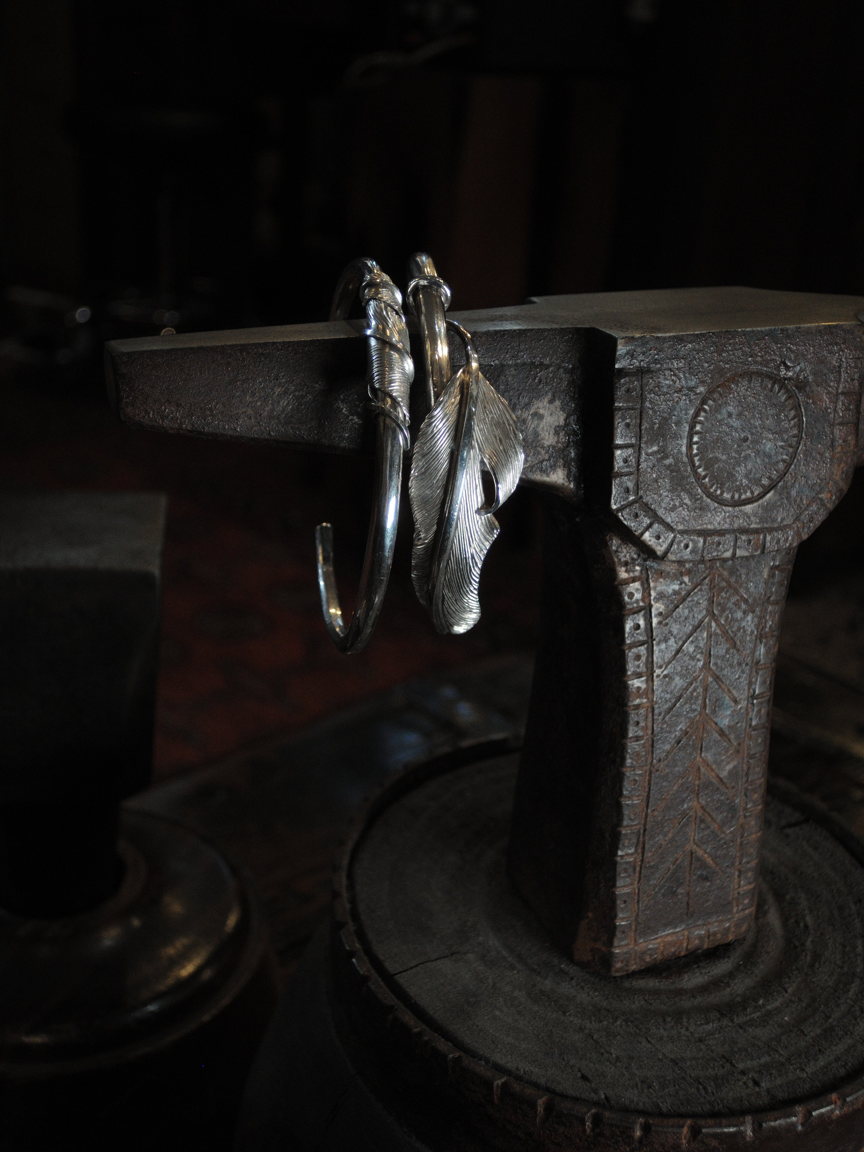 2 sterling silver feather cuffs made using traditional repousse and chasing techniques